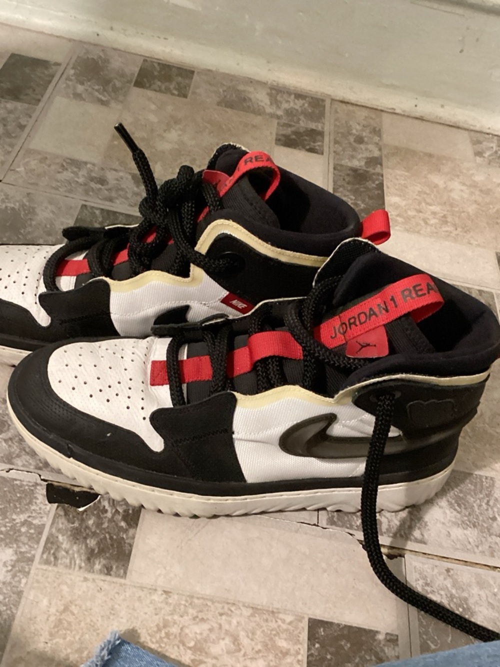 Jordan 1 react black white and red